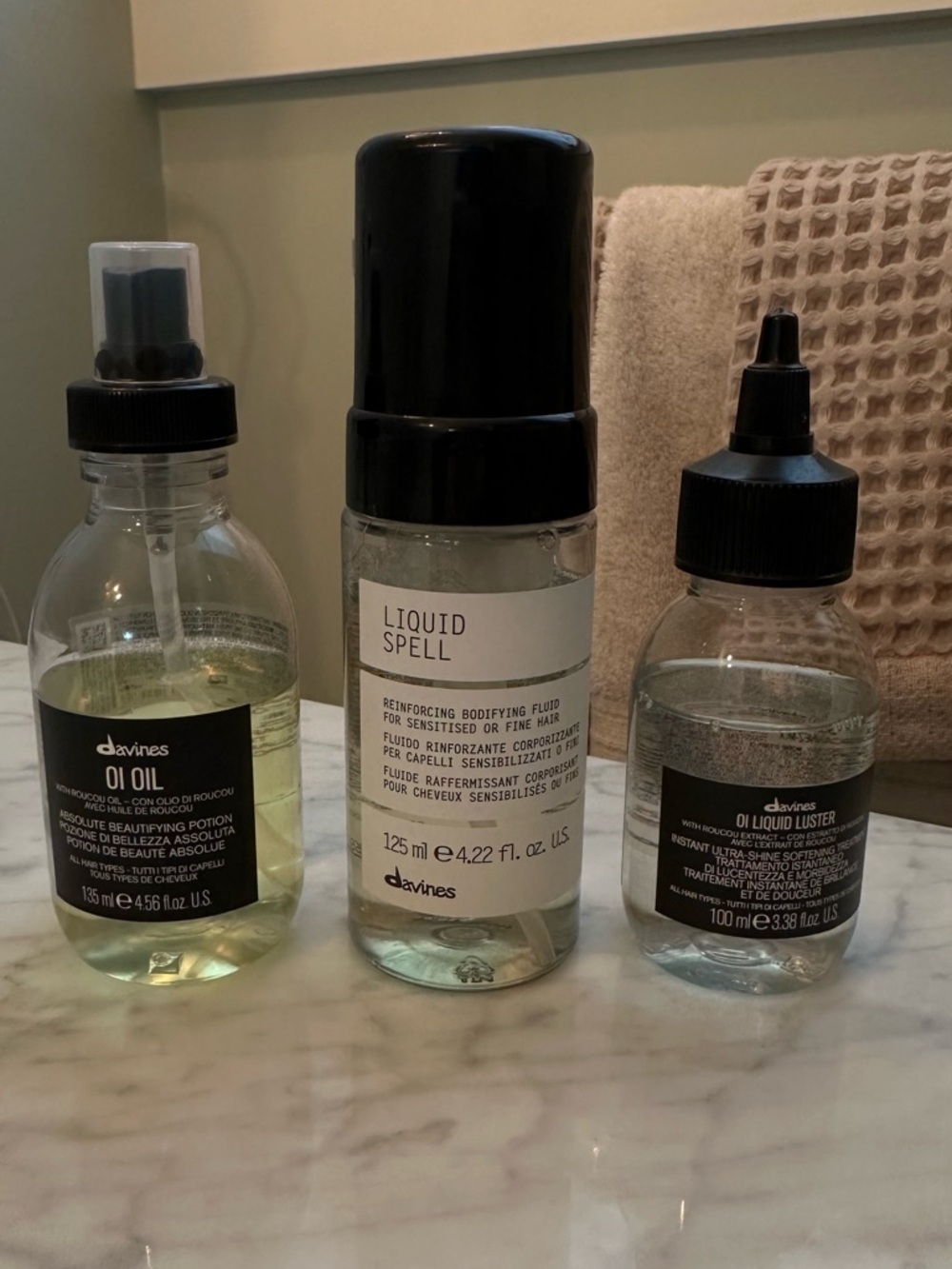 Davines hair care products (oi oil, liquid spell, oi liquid luster)
